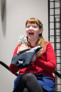 Puppeteer Stacey Gordon laughing at closing ceremonies of Capricon 36